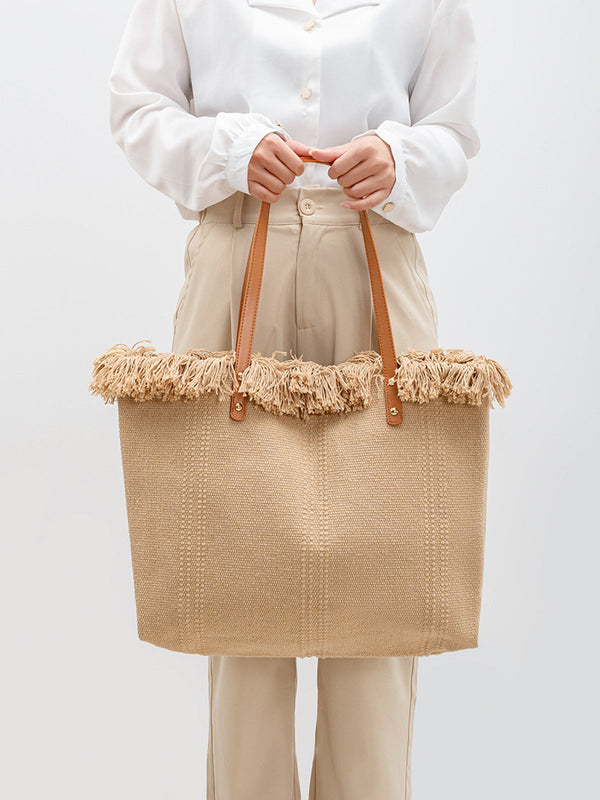 Handwoven Raffia Tote Bag with Fringe Trim
